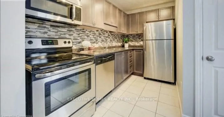 Photo 3 of Unit 13A, 55 Mooregate Crescent, Kitchener — HOMEH
