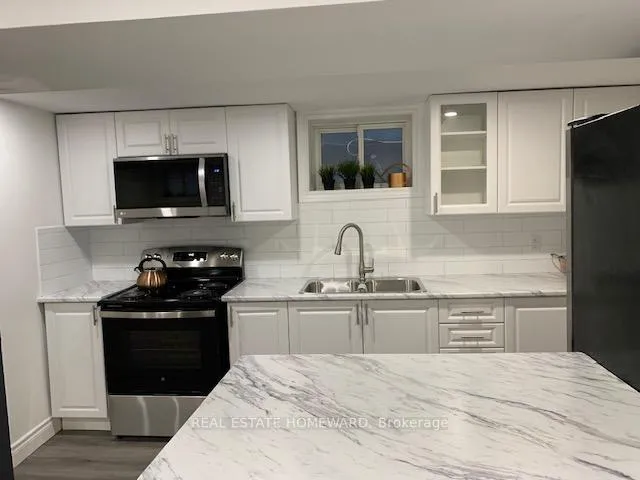 Photo 14 of 27 Torrens (basement) Avenue, Toronto, Broadview North — HOMEH