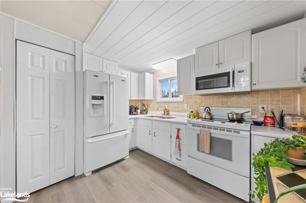 Photo 8 of Unit 6, 5263 Elliott Sideroad, Tay, Rural Tay — HOMEH