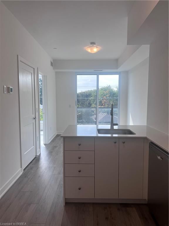 Photo 3 of Unit 306, 312 Erb Street W, Waterloo, Beechwood/University — HOMEH