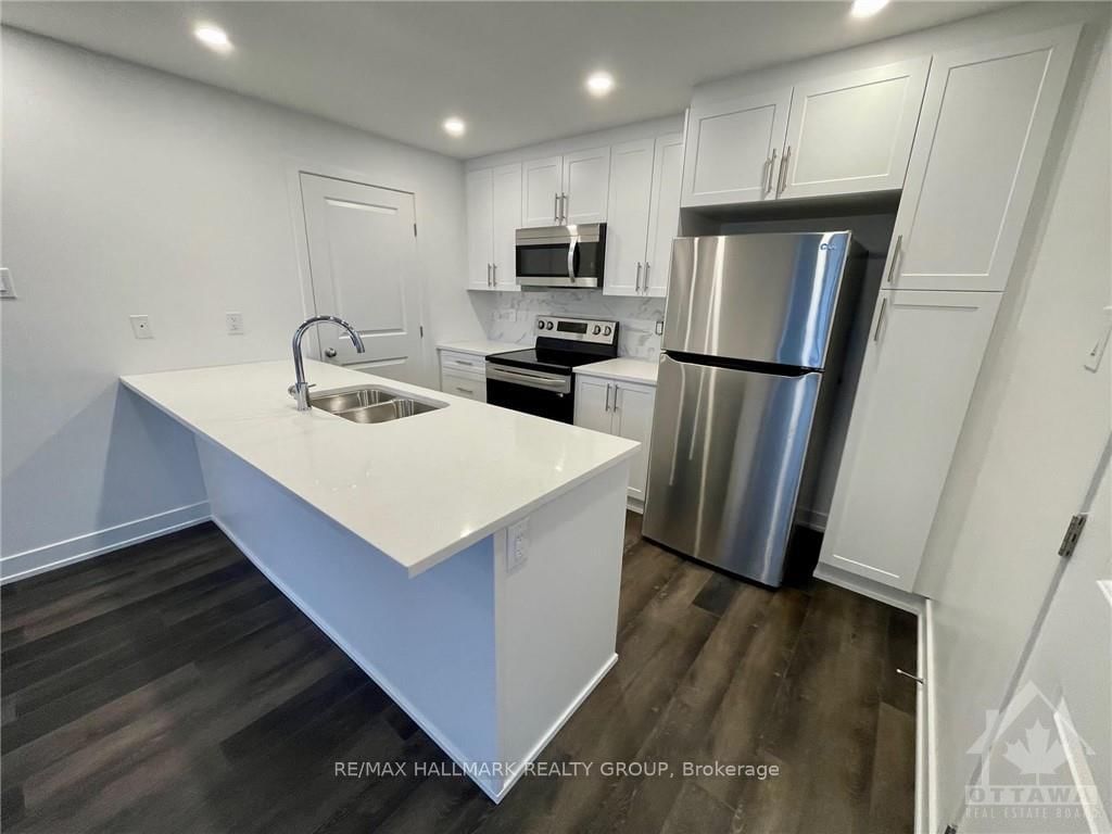 Photo 4 of 400J ROLLING MEADOW Cres, Ottawa, Mer Bleue/Bradley Estates/Anderson Park — HOMEH