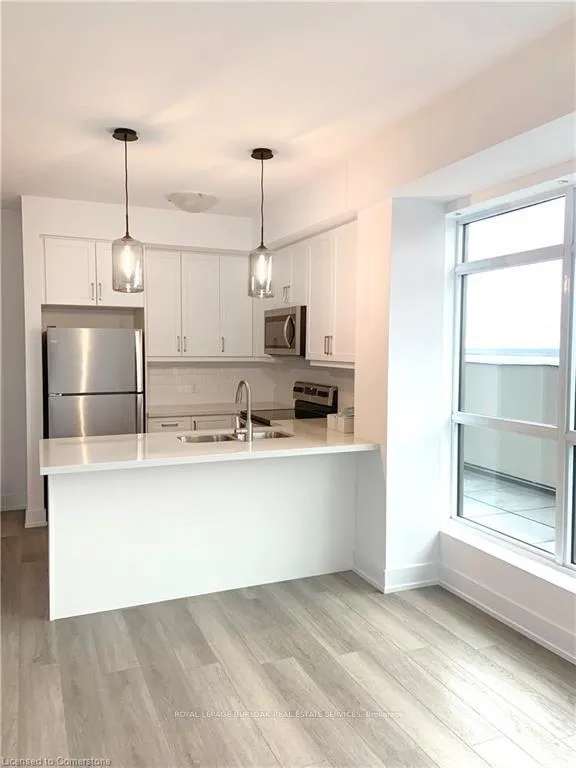 Photo 3 of Unit 1002, 460 Dundas Street E, Hamilton, Waterdown — HOMEH