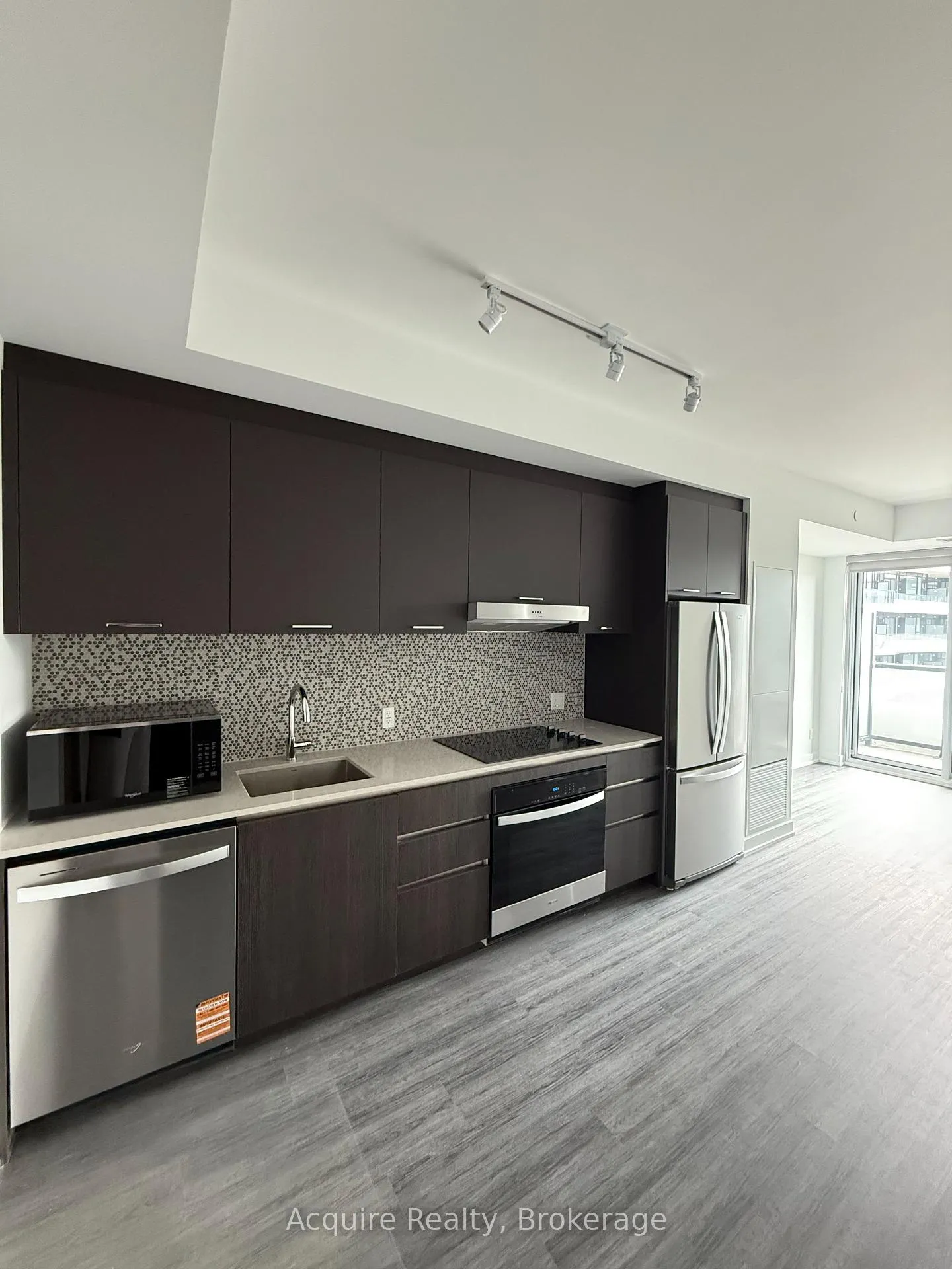 Photo 3 of Unit 404, 8188 Yonge Street, Vaughan, Uplands — HOMEH
