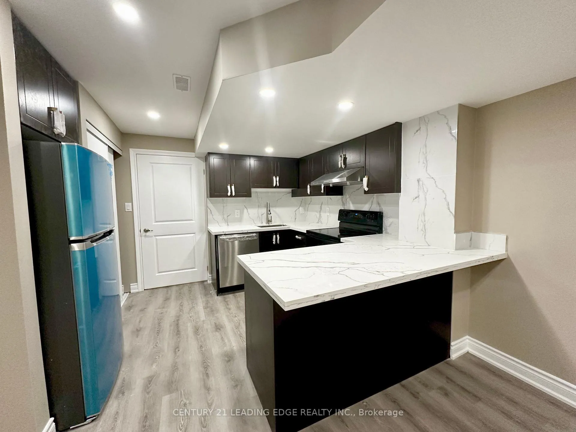 Photo 2 of Unit BSMT, 30 Huggins Drive, Whitby, Rural Whitby — HOMEH