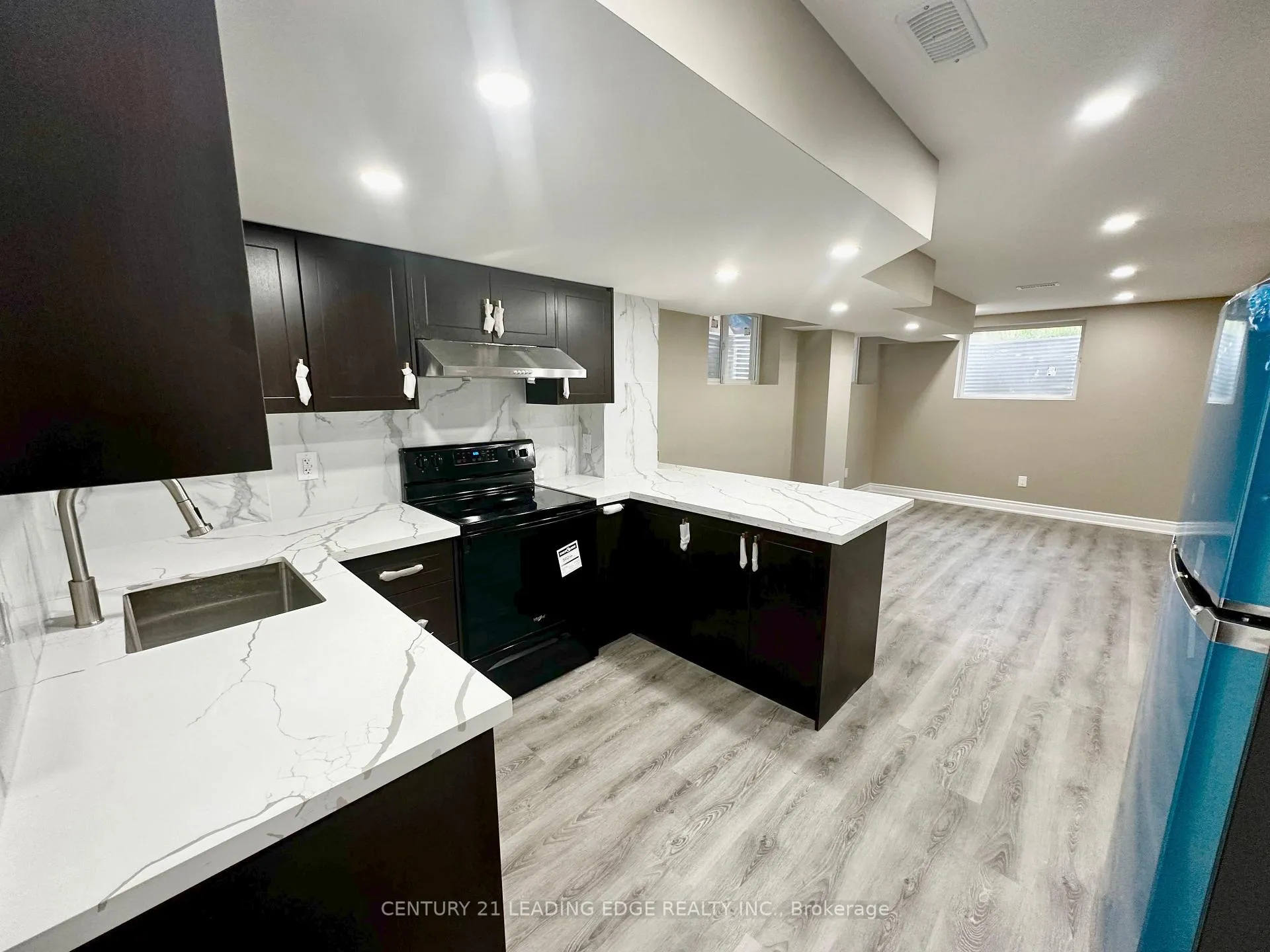 Photo 3 of Unit BSMT, 30 Huggins Drive, Whitby, Rural Whitby — HOMEH