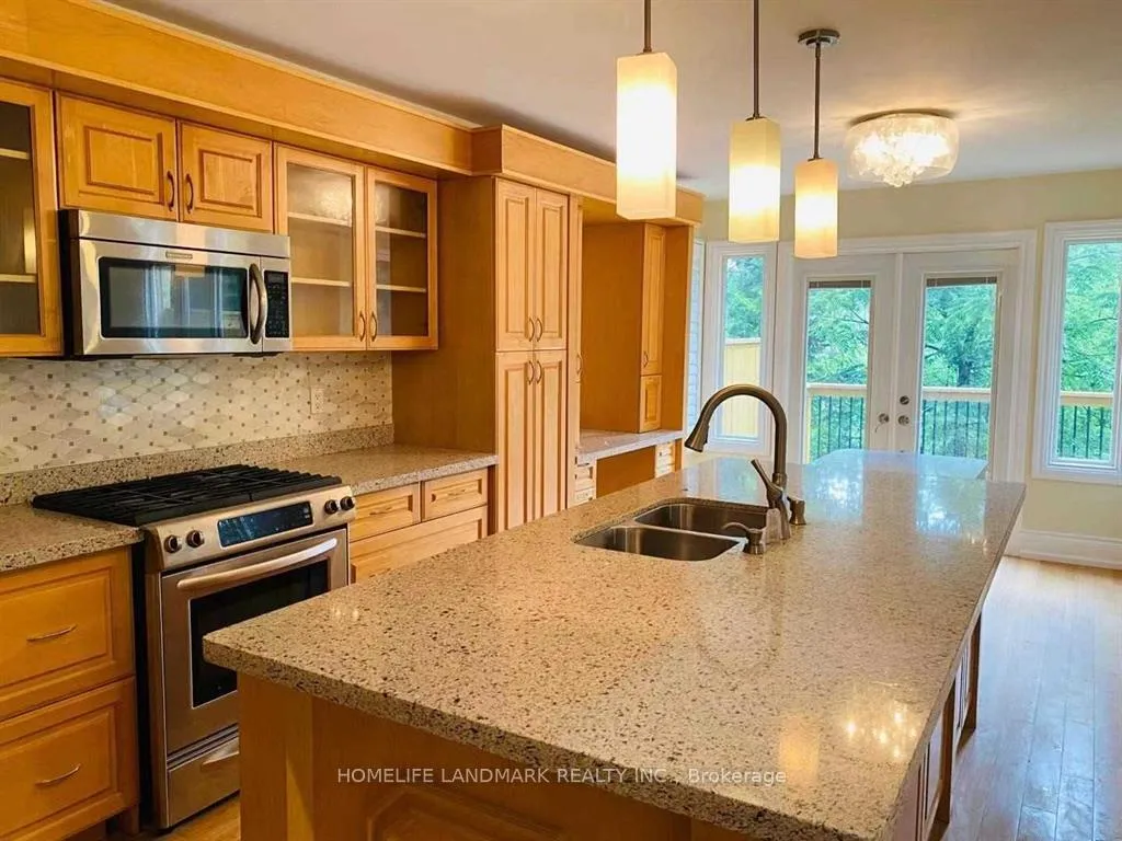 Photo 3 of Unit Main & 2nd, 168 Timpson Drive, Aurora, Aurora Highlands — HOMEH