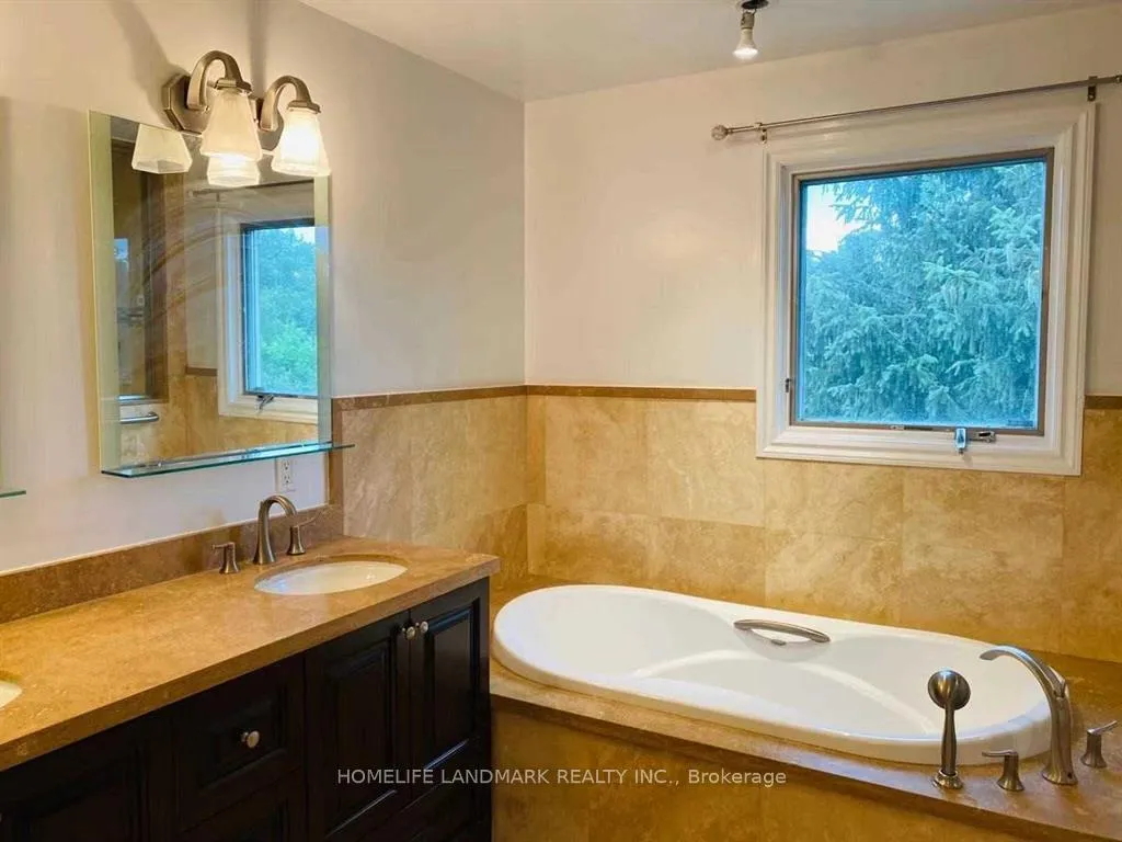 Photo 6 of Unit Main & 2nd, 168 Timpson Drive, Aurora, Aurora Highlands — HOMEH