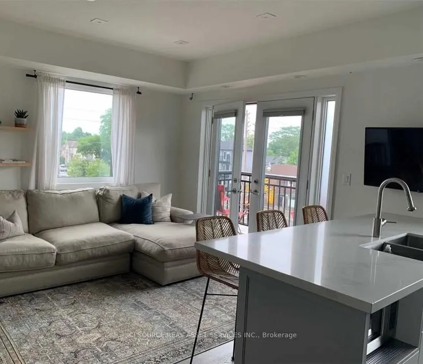 Photo 3 of Unit 2, 100 Coxwell Avenue, Toronto, Greenwood-Coxwell — HOMEH