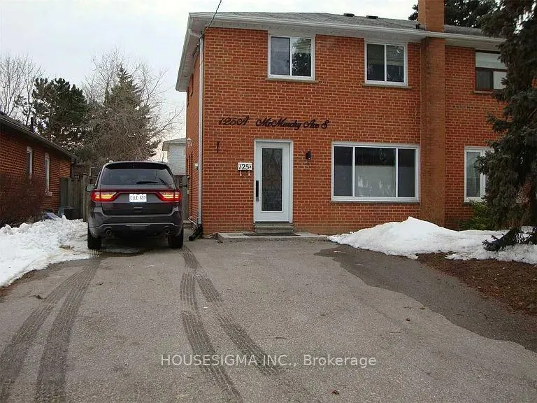 Front of 125 Mcmurchy Avenue S