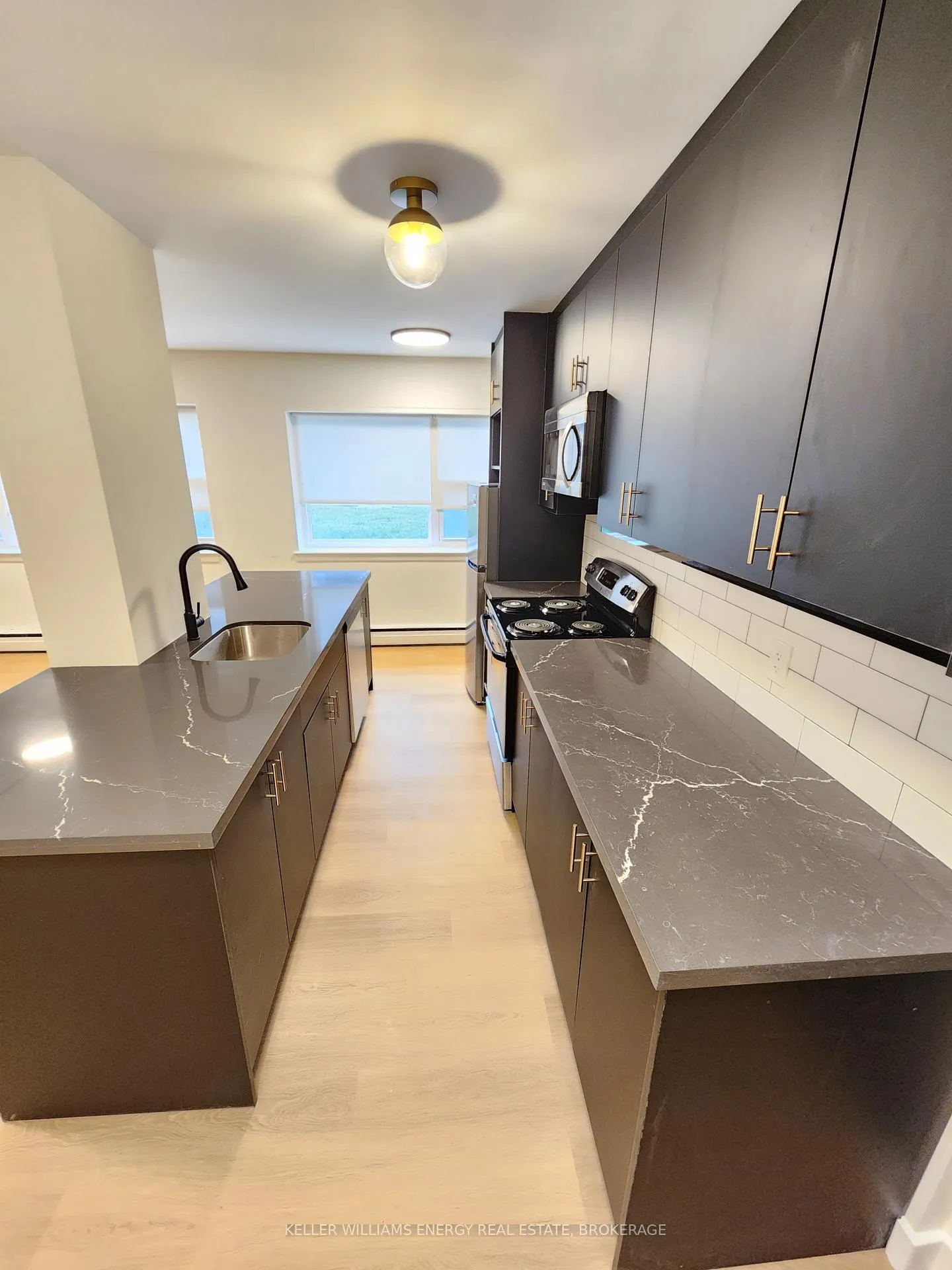 Photo 3 of Unit 102, 111 Craydon Road, Whitby, Downtown Whitby — HOMEH