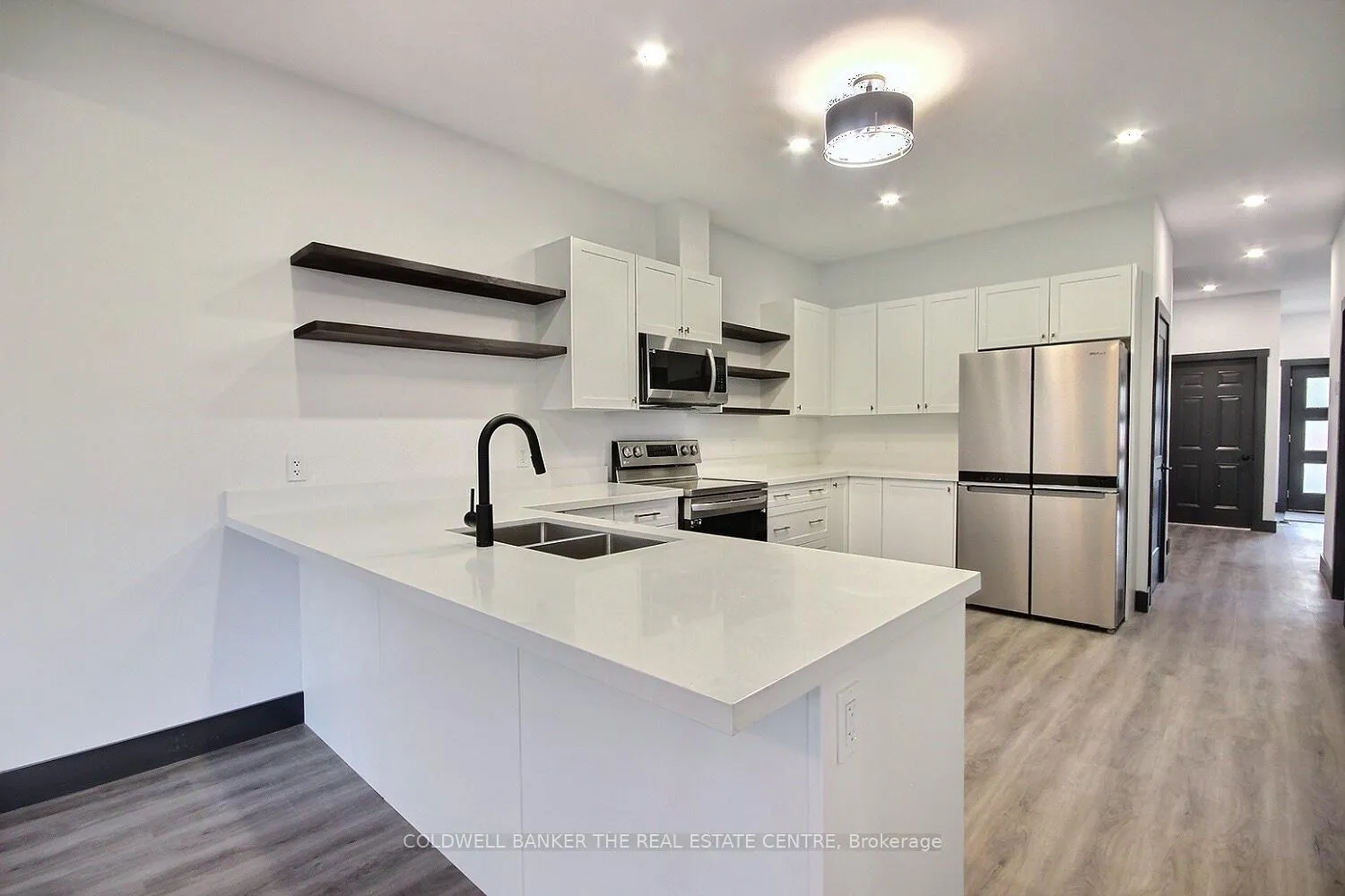 Photo 4 of Unit B, 23 Gray Street, Severn, Coldwater — HOMEH