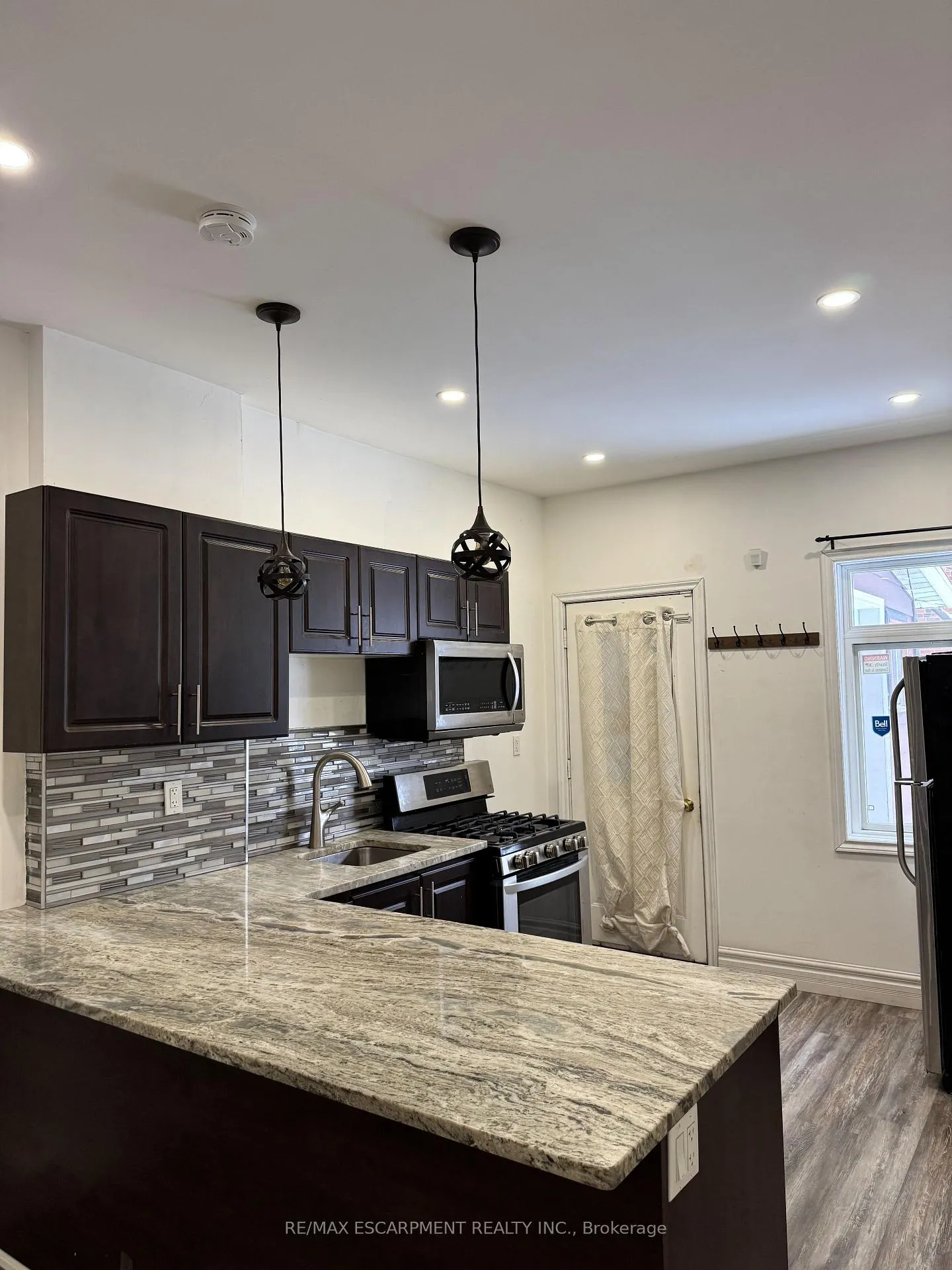Photo 1 of Unit 2, 1152 King Street E, Hamilton, Crown Point — HOMEH