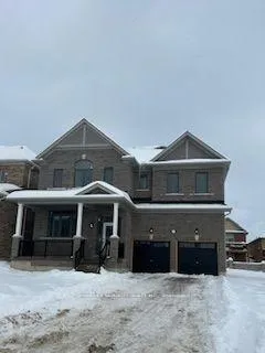 Front of 69 Lawrence D. Pridham Avenue