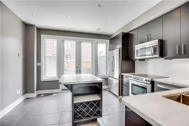 Photo 5 of 8303 Kipling Avenue, Vaughan, West Woodbridge — HOMEH