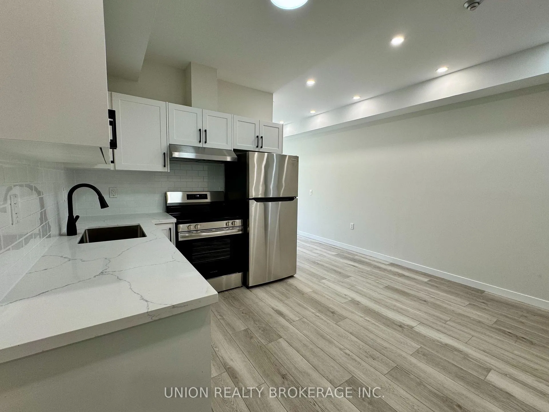 Photo 4 of Unit 1, 1184 Queen Street E, Toronto, South Riverdale — HOMEH