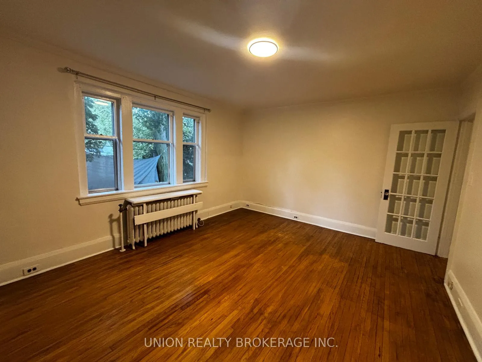 Photo 3 of Unit 2, 2453 Queen Street E, Toronto, The Beaches — HOMEH