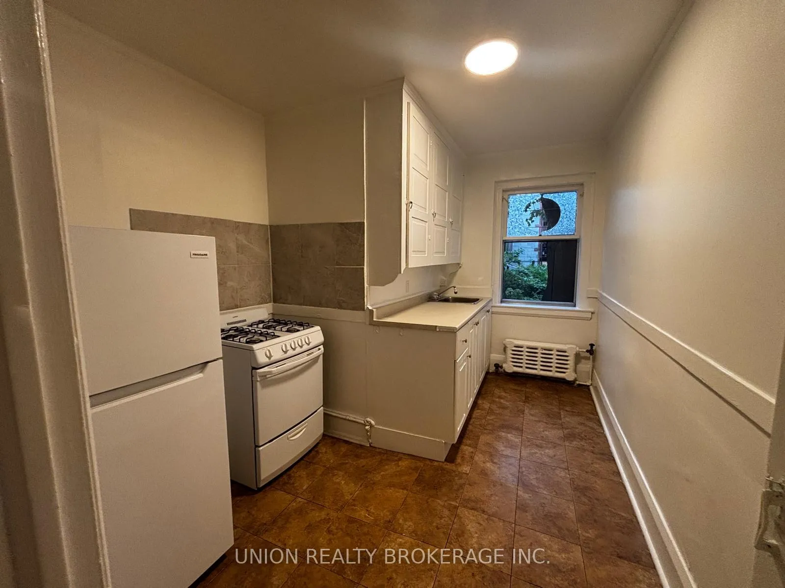 Photo 5 of Unit 2, 2453 Queen Street E, Toronto, The Beaches — HOMEH