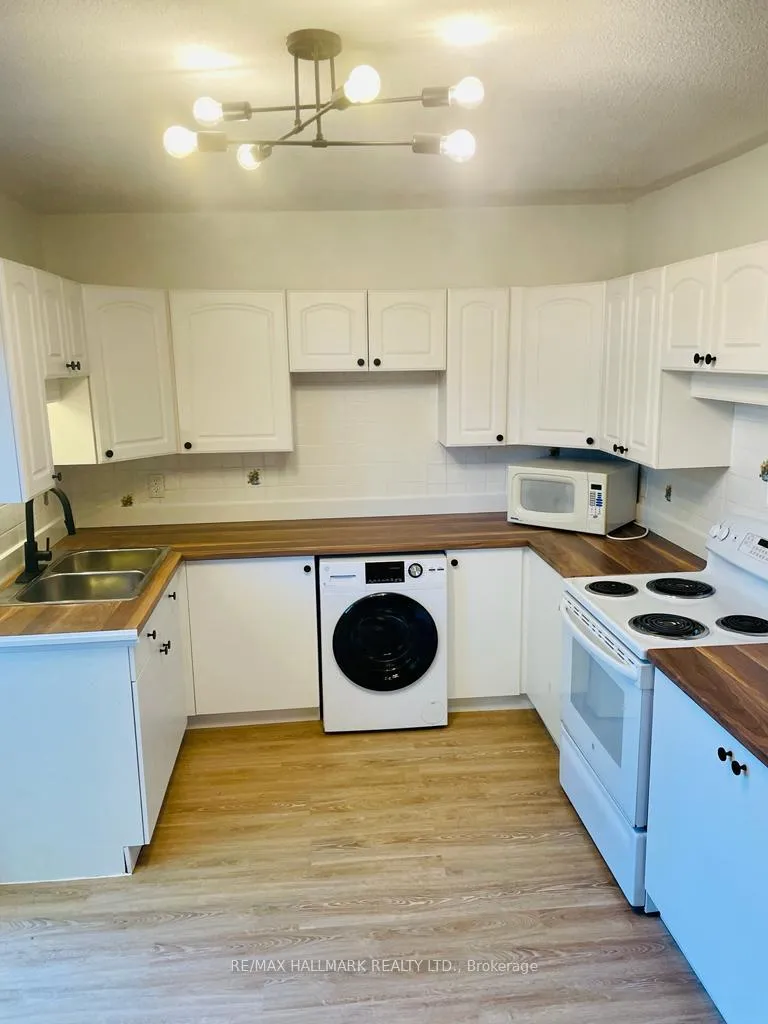 Photo 3 of Unit Upper, 142 Parkmount Road, Toronto, Greenwood-Coxwell — HOMEH