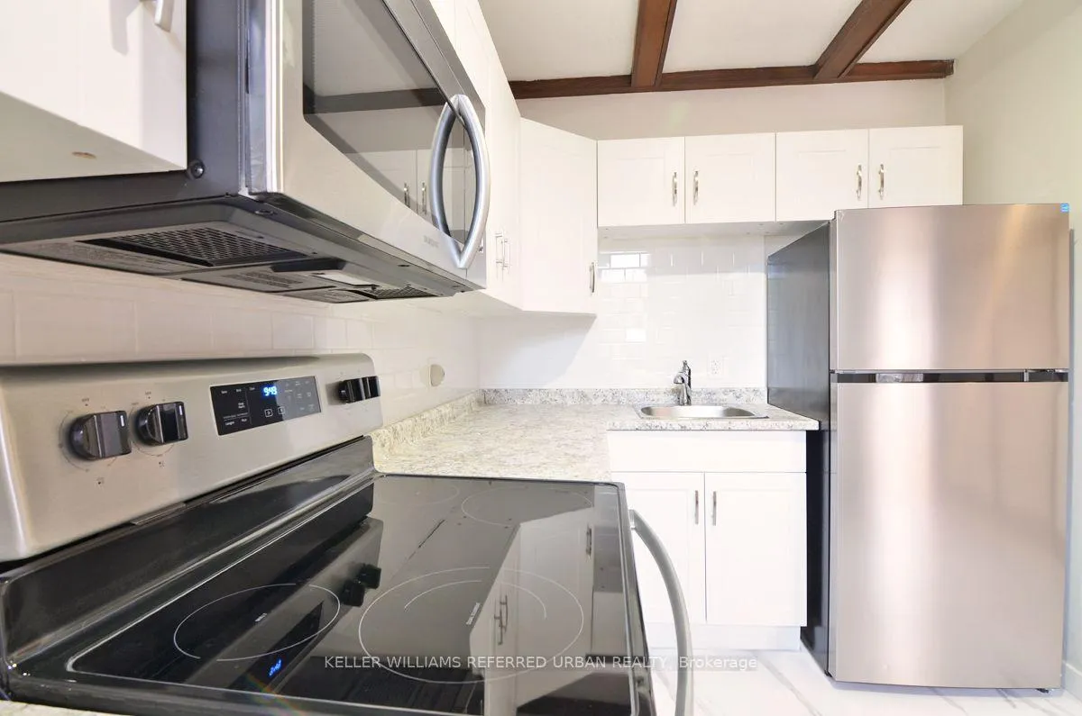Photo 5 of Unit Upper, 4 Columbine Avenue, Toronto, The Beaches — HOMEH