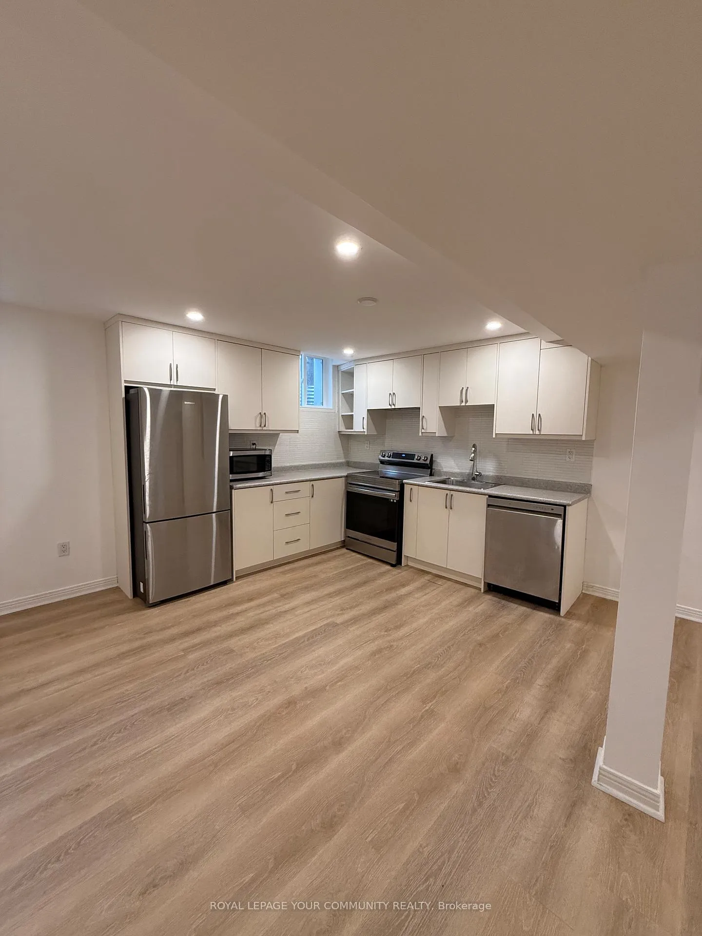 Photo 2 of Unit bsmnt, 87 Tamarac Trail, Aurora, Aurora Highlands — HOMEH