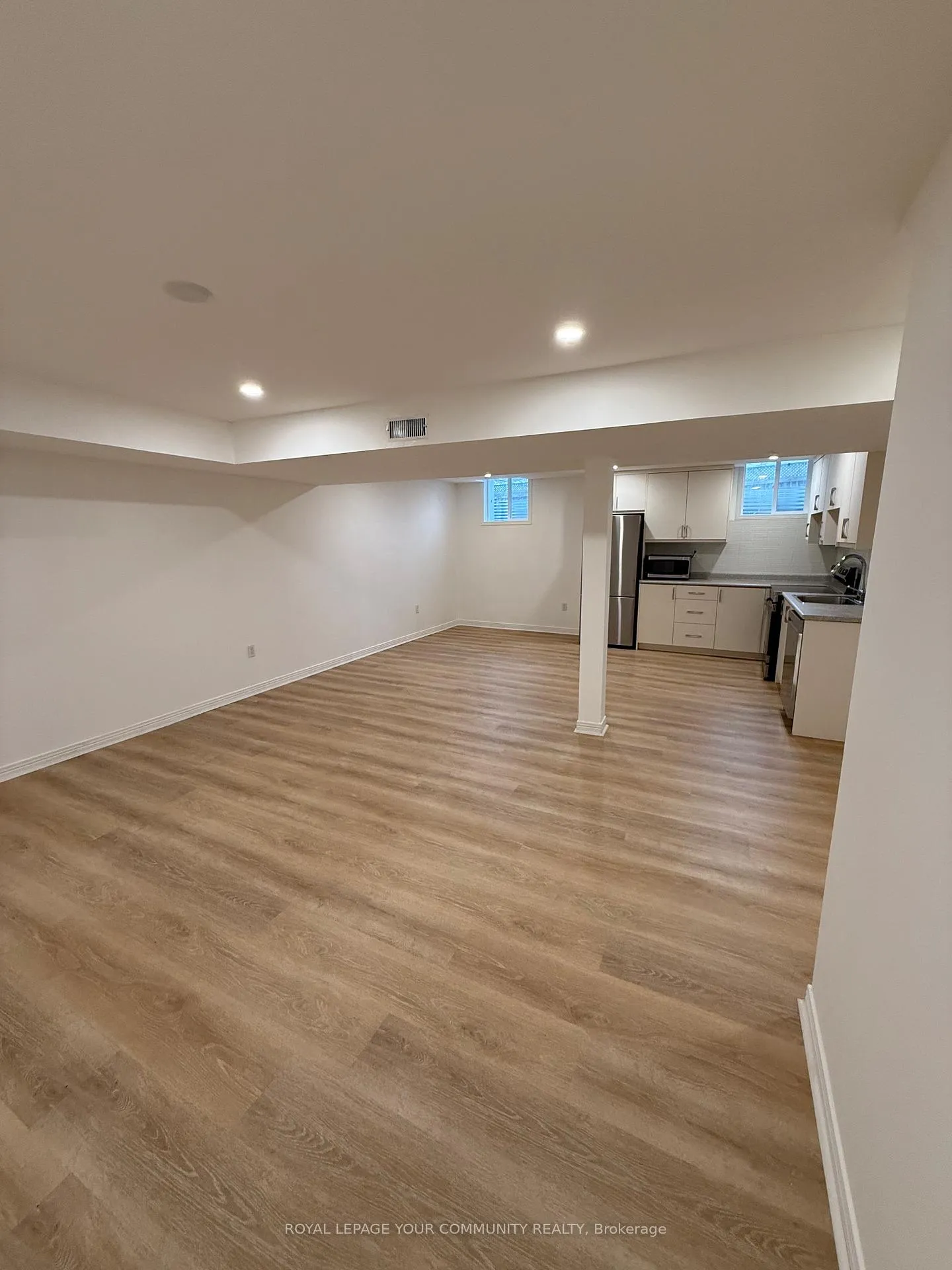 Photo 3 of Unit bsmnt, 87 Tamarac Trail, Aurora, Aurora Highlands — HOMEH