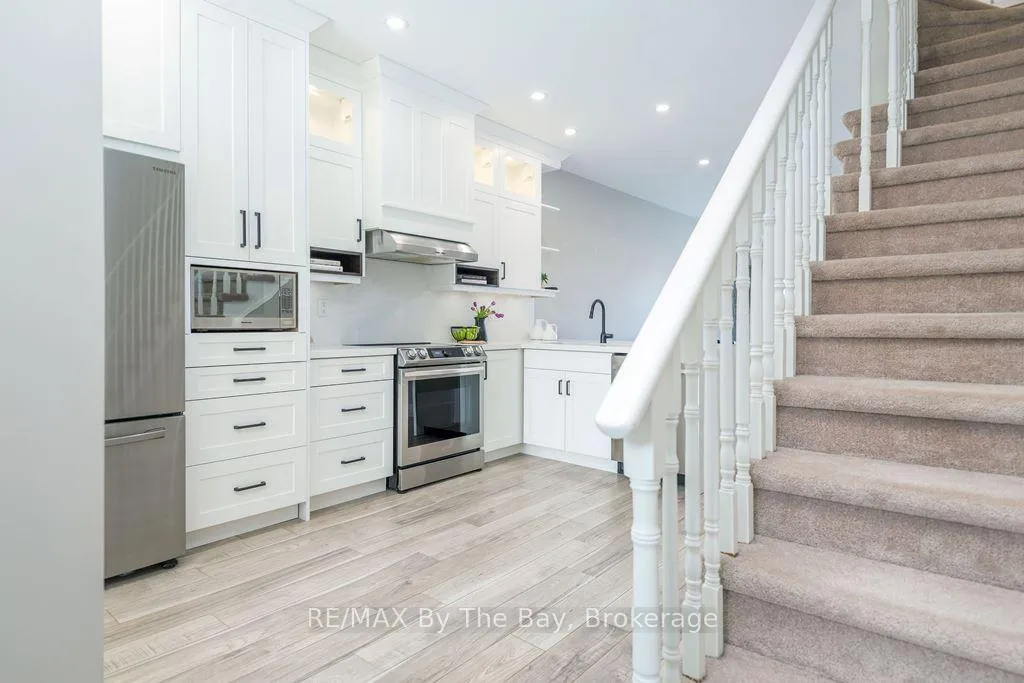 Photo 1 of Unit 7, 216 River Road E, Wasaga Beach — HOMEH