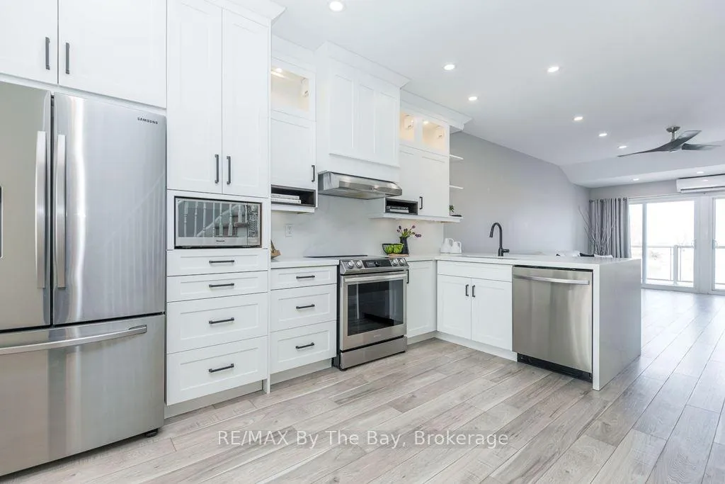 Photo 2 of Unit 7, 216 River Road E, Wasaga Beach — HOMEH