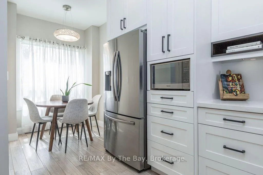 Photo 4 of Unit 7, 216 River Road E, Wasaga Beach — HOMEH
