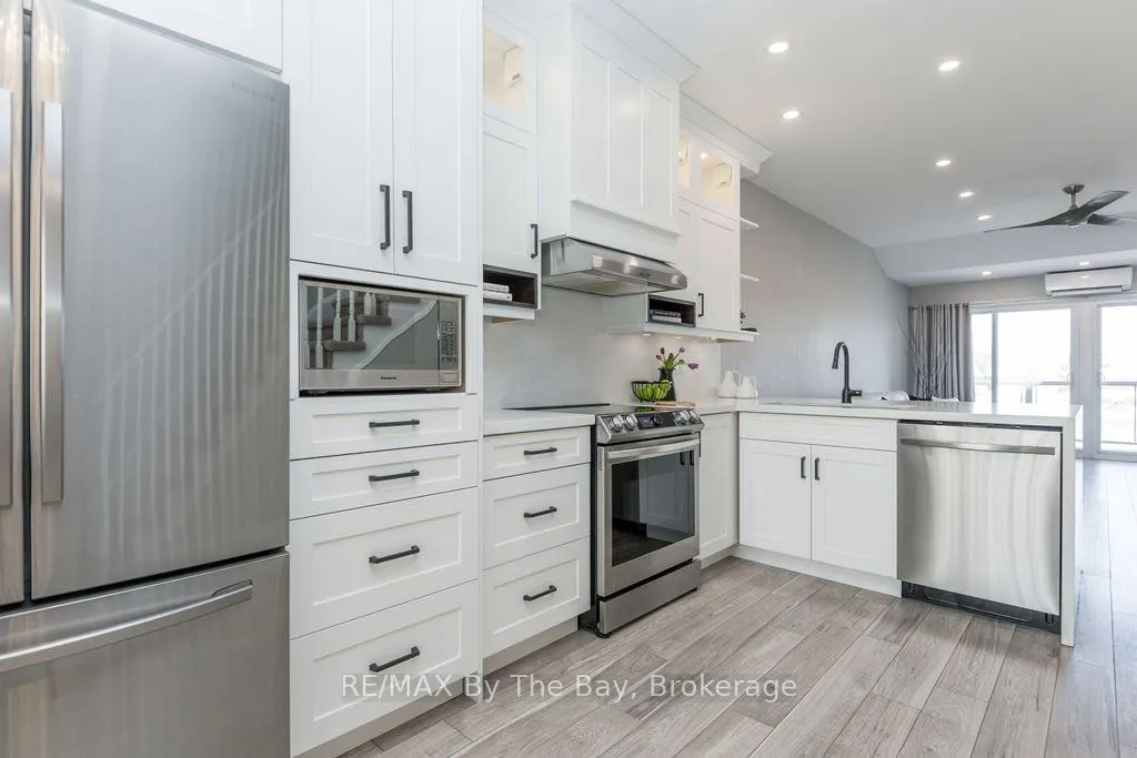 Photo 6 of Unit 7, 216 River Road E, Wasaga Beach — HOMEH
