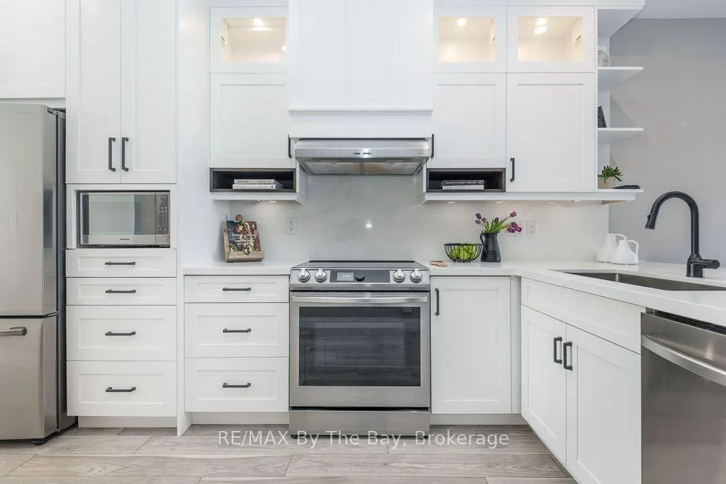 Photo 8 of Unit 7, 216 River Road E, Wasaga Beach — HOMEH