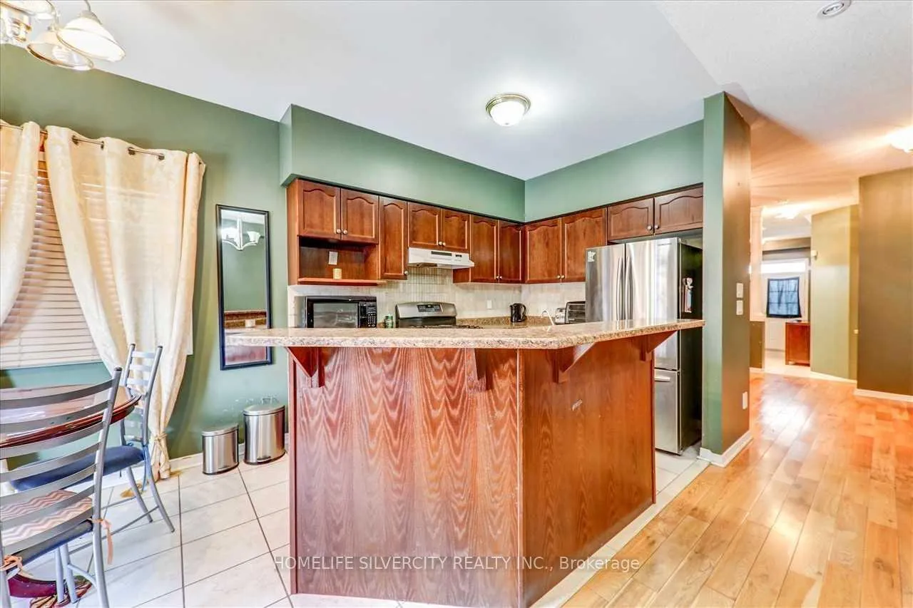 Photo 10 of 200 Roy Rainey Avenue, Markham, Wismer — HOMEH