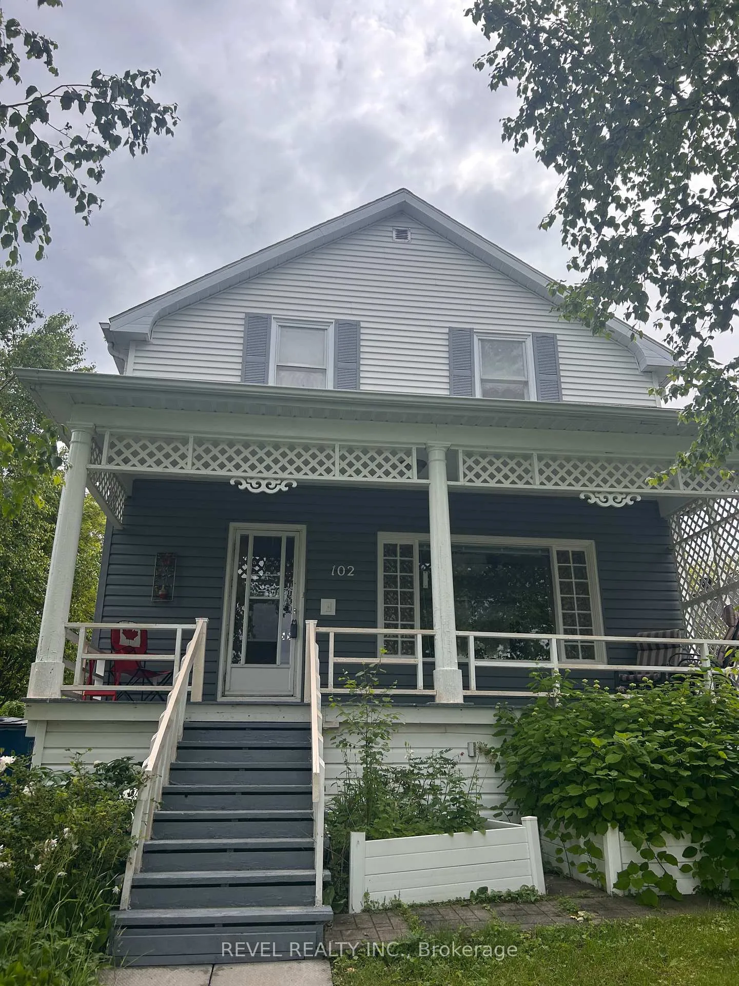 Photo 1 of 102 Twelfth Avenue, Cochrane — HOMEH