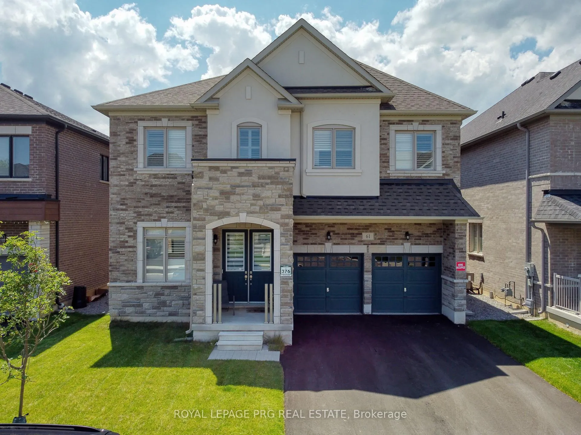 Front of 61 Cattail Crescent