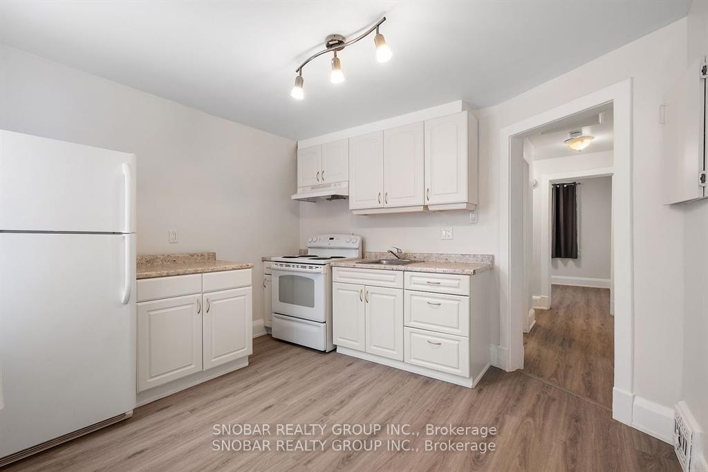Photo 5 of 240 Dunlop Street W, Barrie, Queen's Park — HOMEH