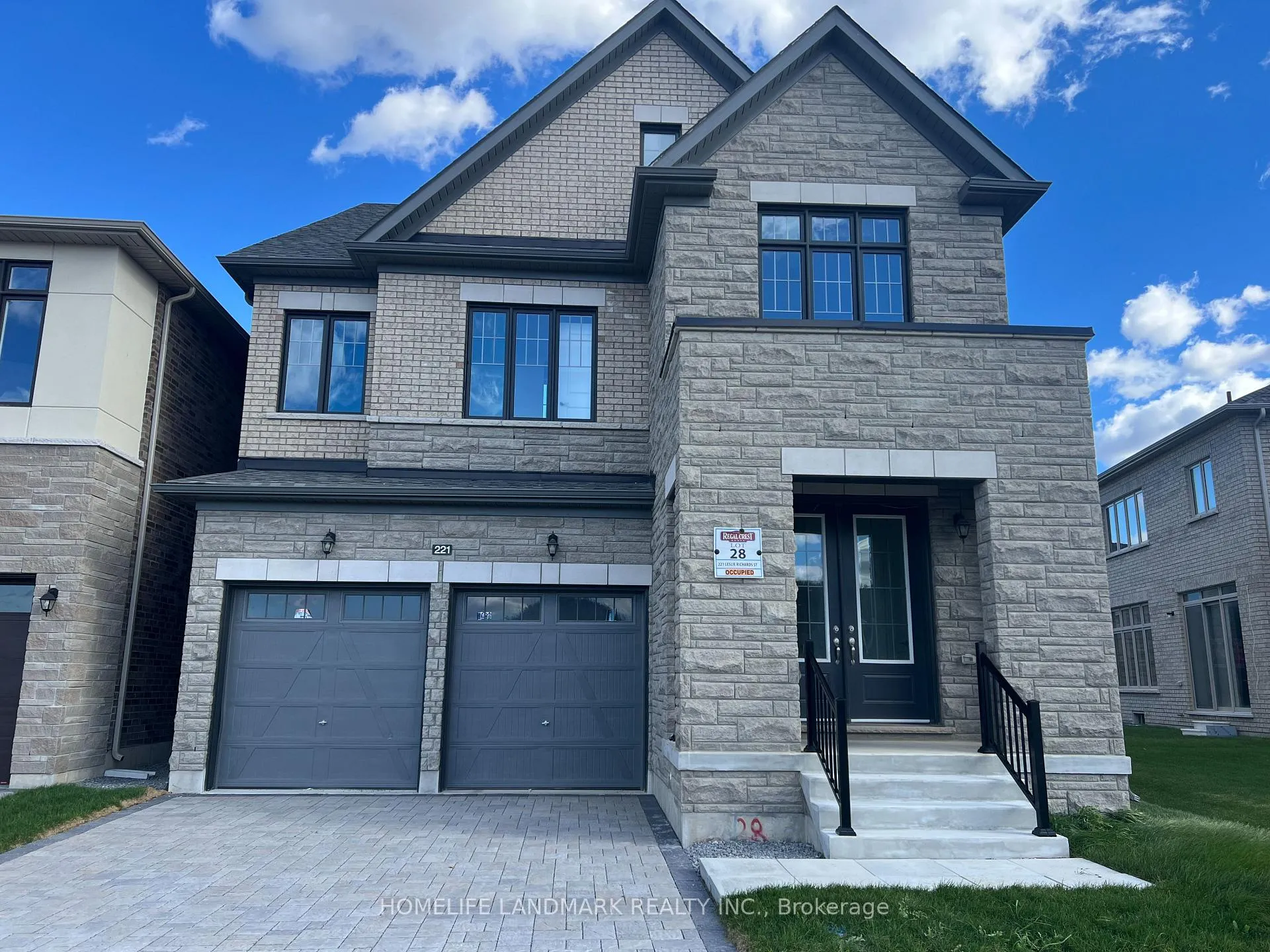Front of 221 Leslie Richard Street
