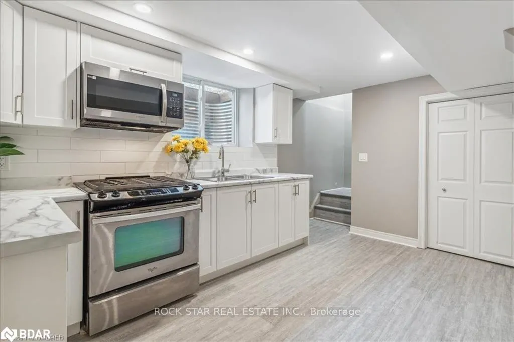 Photo 3 of Unit Lower, 10 Westdale Drive, St. Catharines, Western Hill — HOMEH