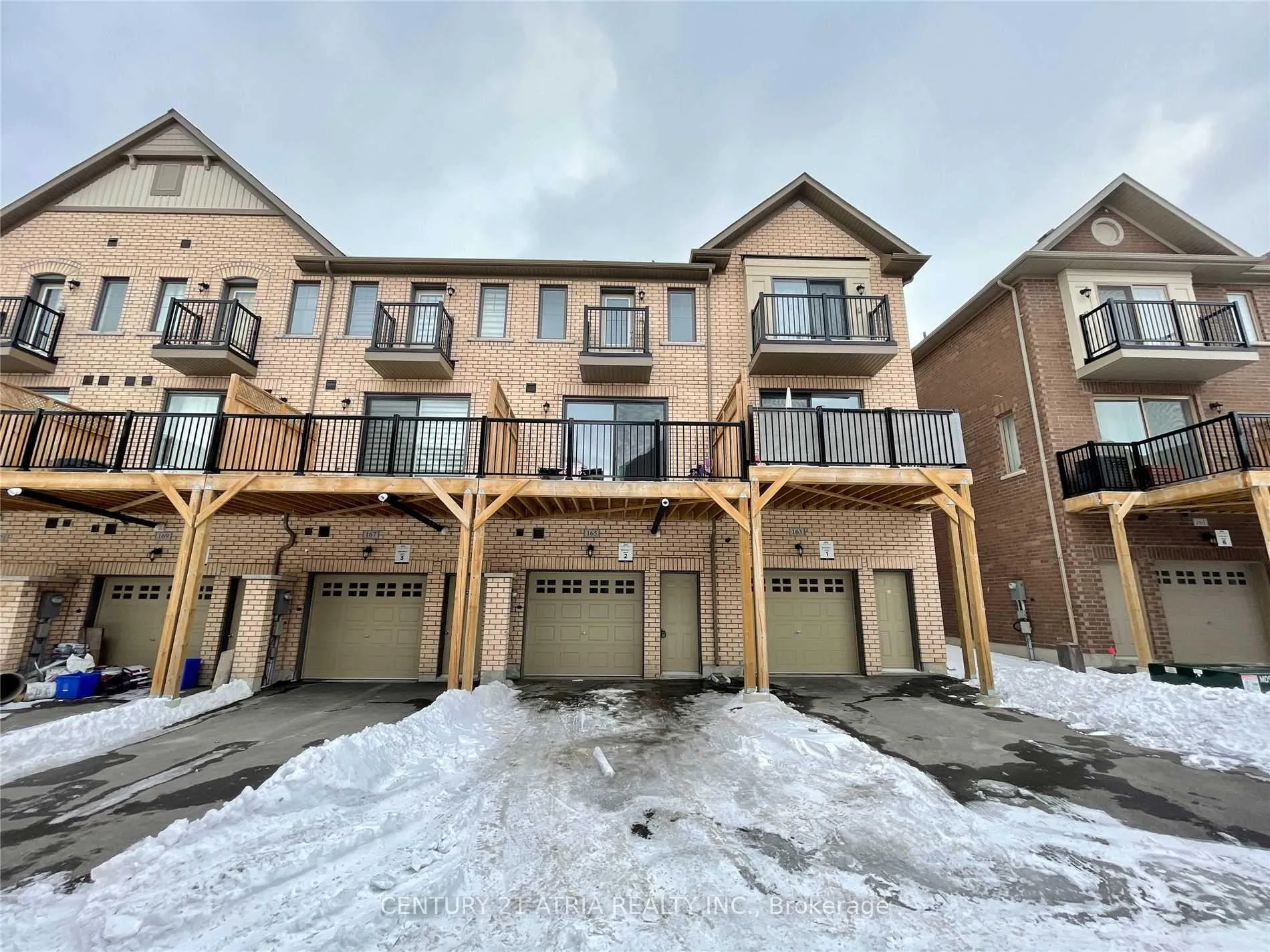 Front of 165 Rustle Woods Avenue