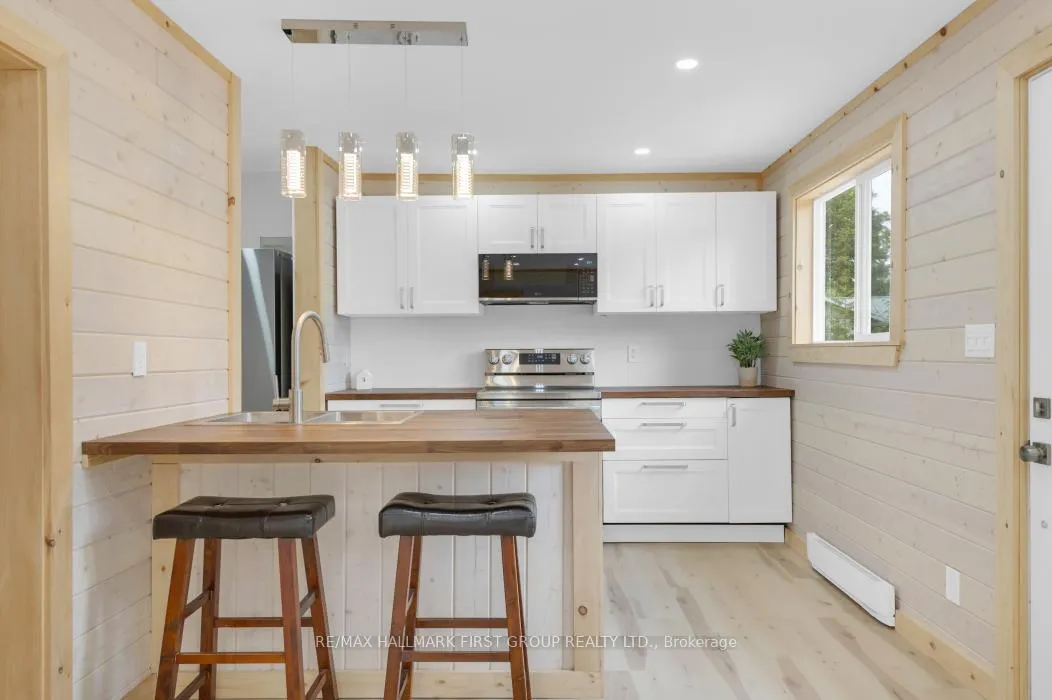 Photo 14 of 94 Tweedsmuir Crescent, Tweed — HOMEH