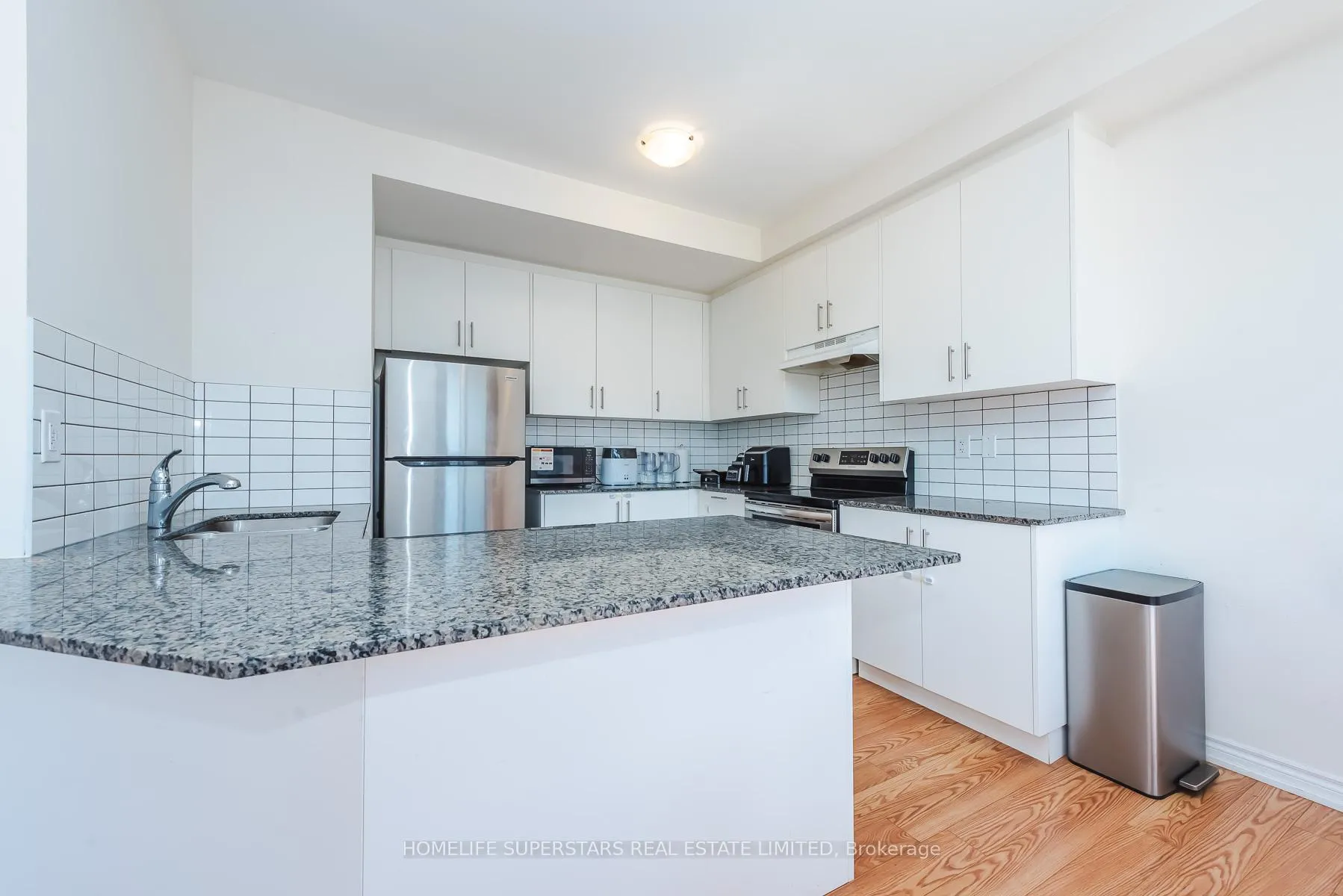Photo 7 of Unit 3, 10 Knotsberry Circle, Brampton, Bram West — HOMEH