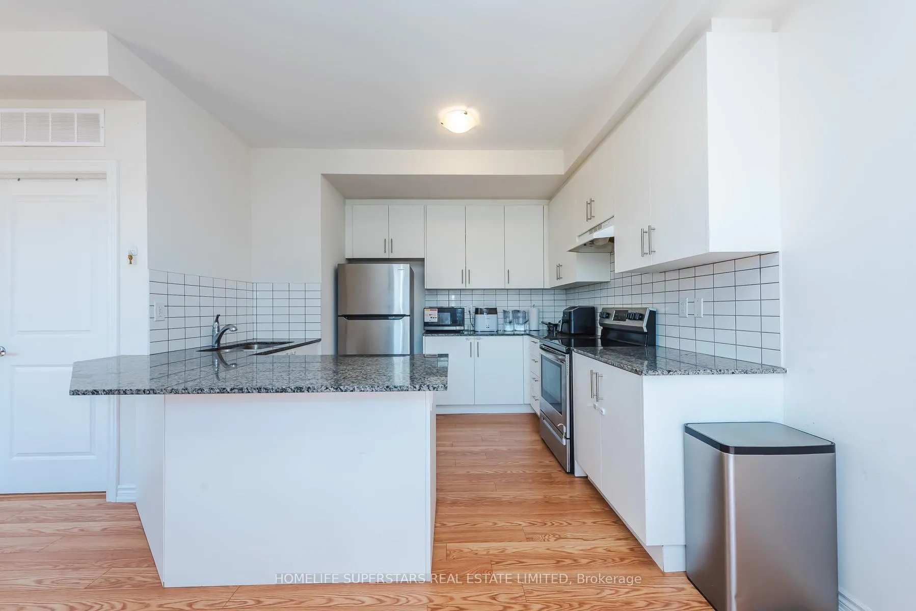 Photo 9 of Unit 3, 10 Knotsberry Circle, Brampton, Bram West — HOMEH