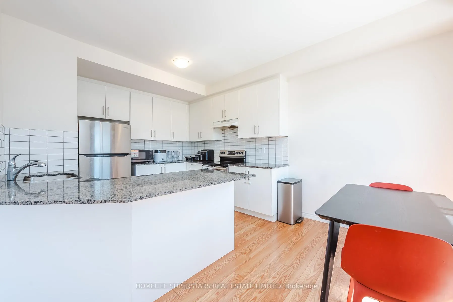 Photo 11 of Unit 3, 10 Knotsberry Circle, Brampton, Bram West — HOMEH