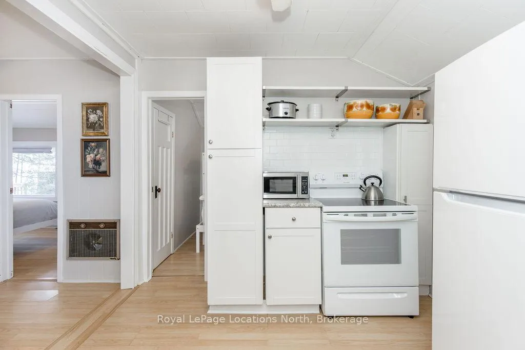 Photo 5 of 948 River Road E, Wasaga Beach — HOMEH