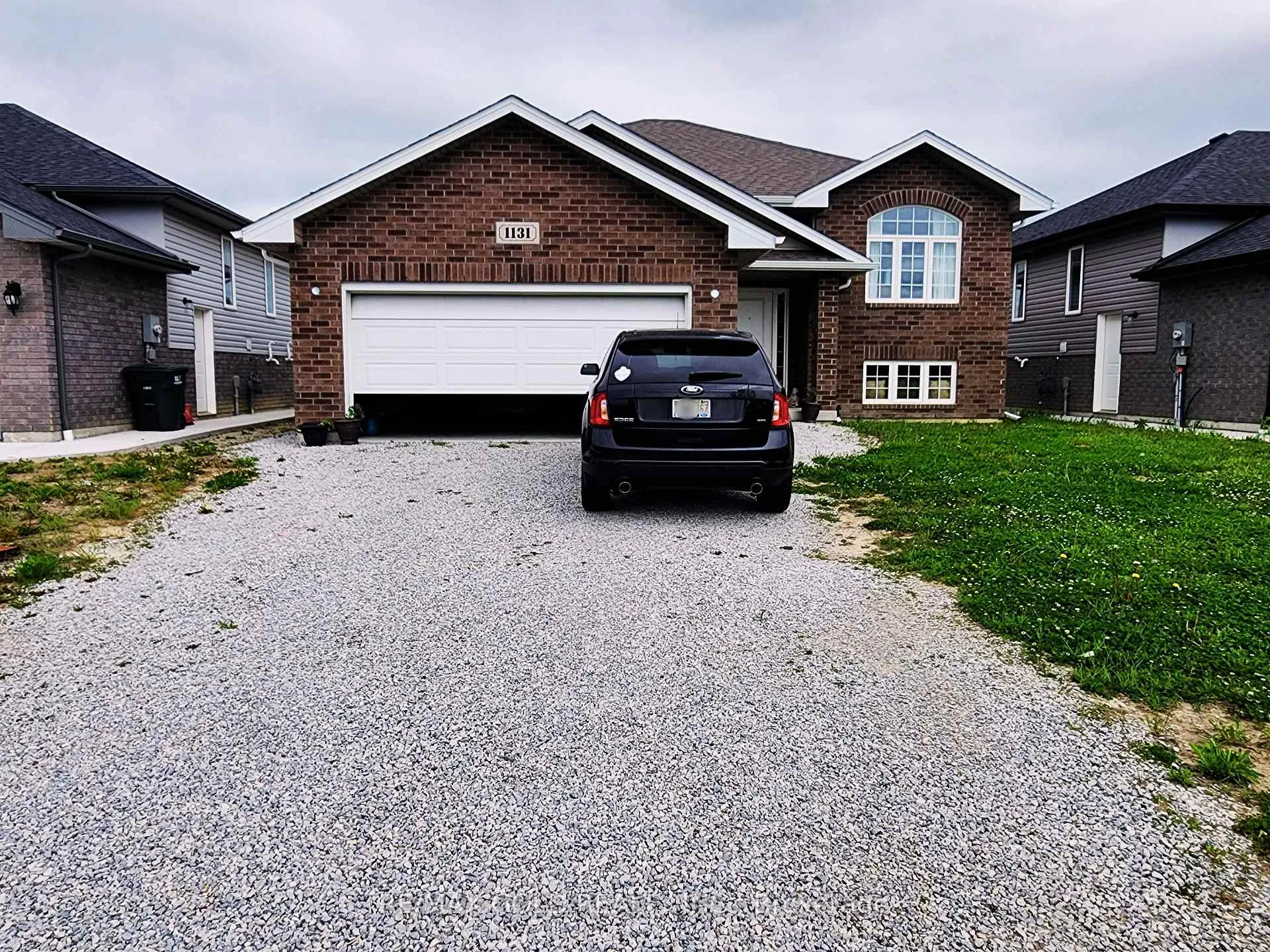 Front of 1131 Aspen Ridge Crescent