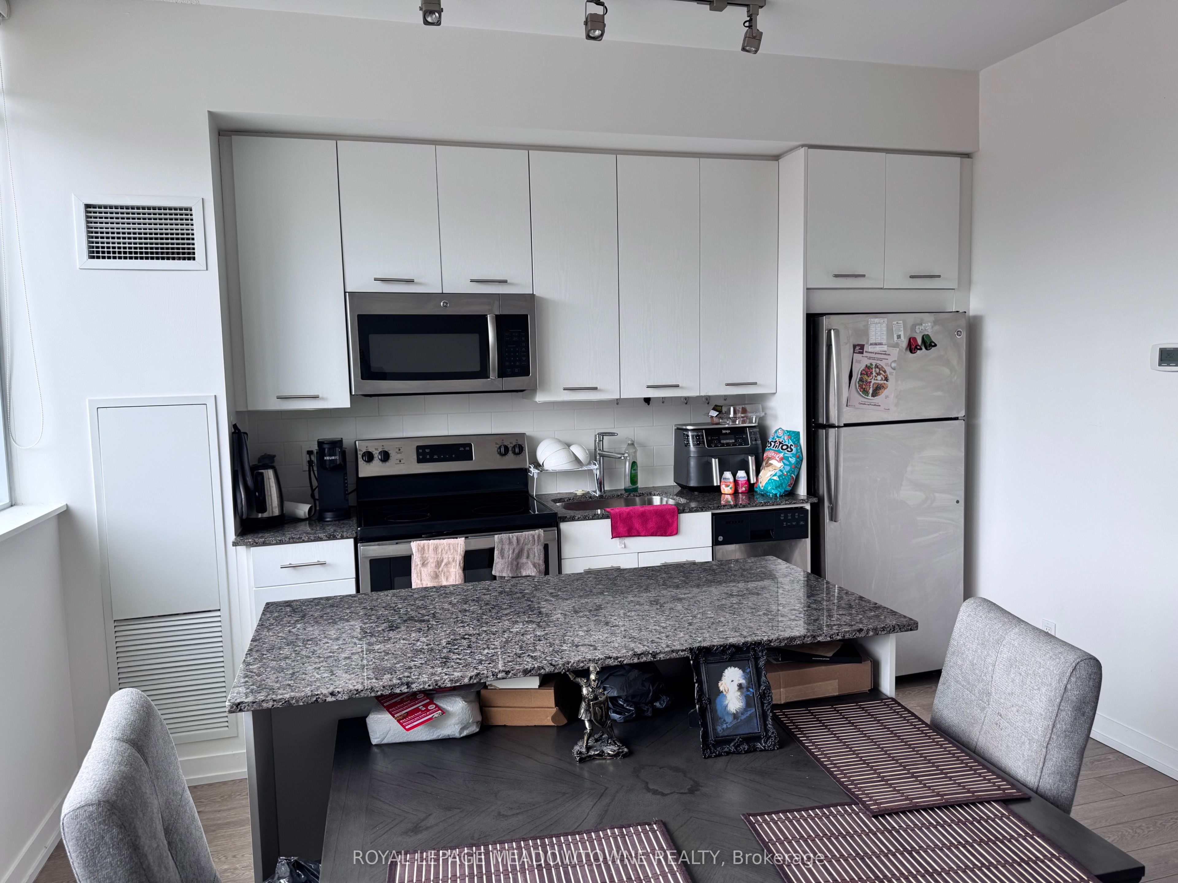 Photo 3 of Unit 213, 2055 Danforth Avenue, Toronto, Woodbine Corridor — HOMEH