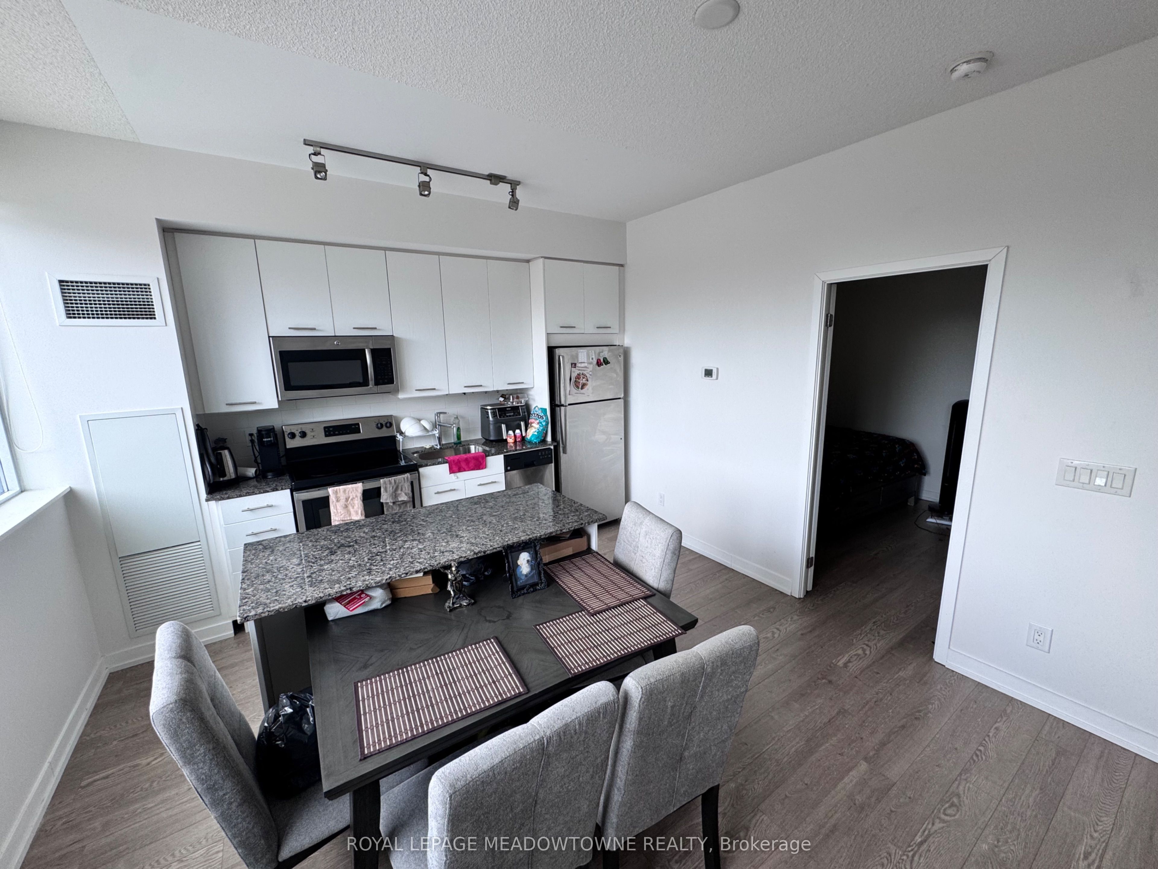 Photo 4 of Unit 213, 2055 Danforth Avenue, Toronto, Woodbine Corridor — HOMEH