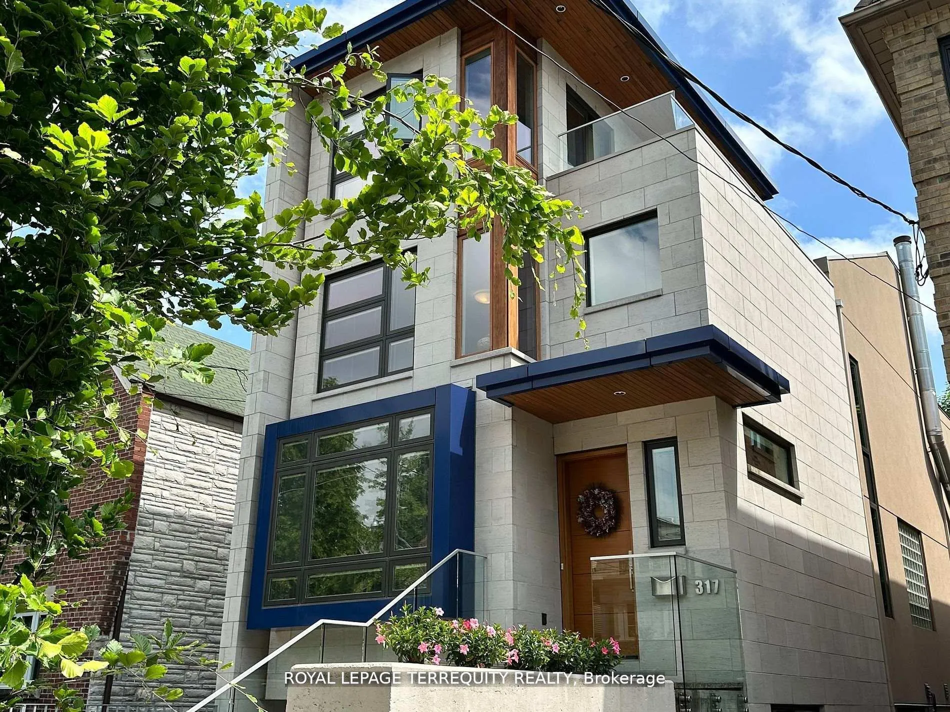 Front of 317 Keewatin Avenue
