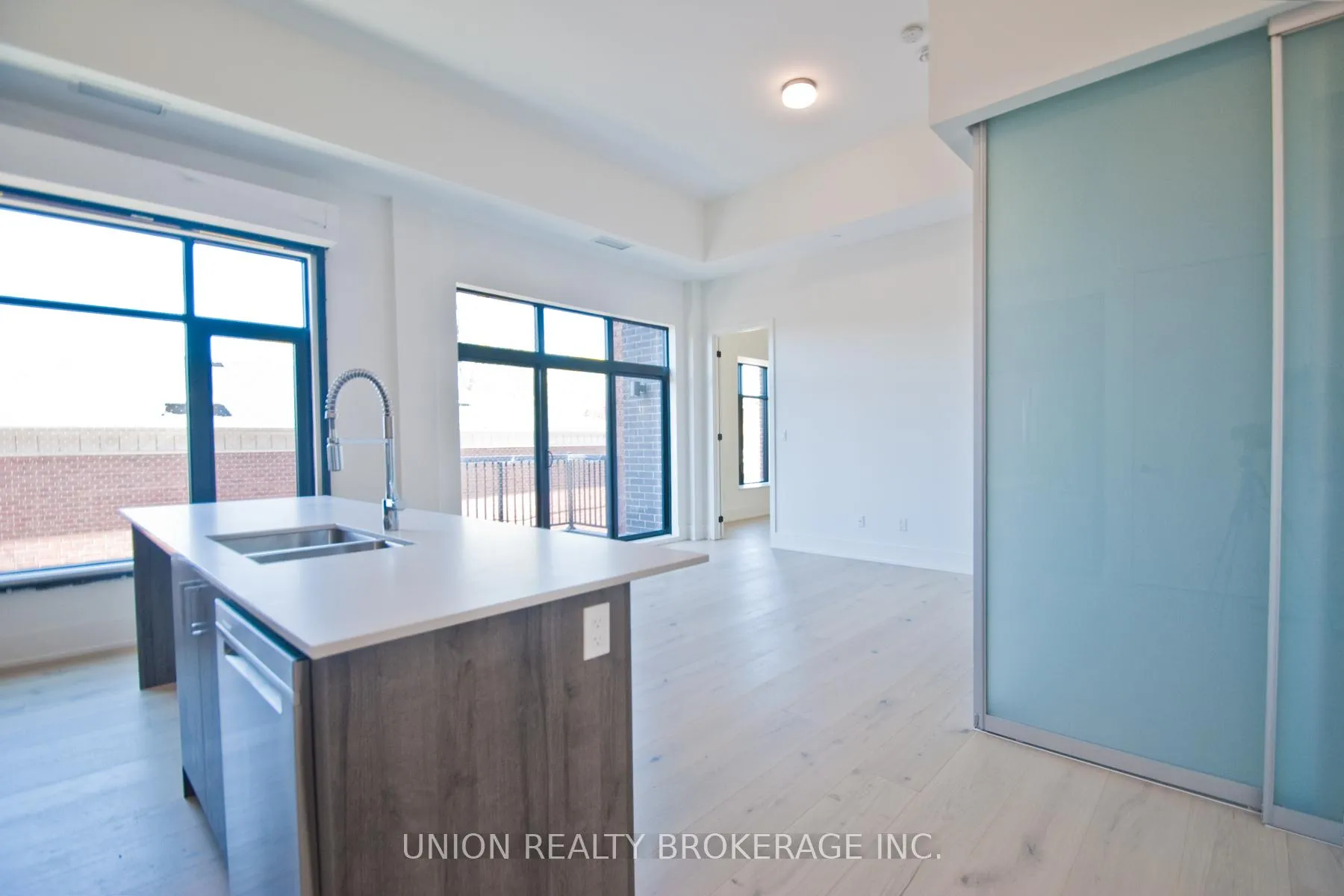 Photo 3 of Unit 305, 14 Dewhurst Boulevard, Toronto, Danforth — HOMEH