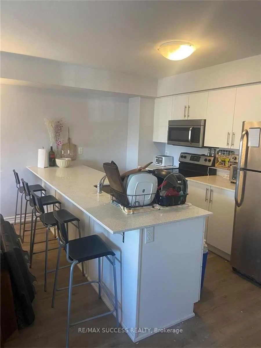 Photo 6 of Unit 9, 246 Penetanguishene Rd, Barrie, Georgian Drive — HOMEH