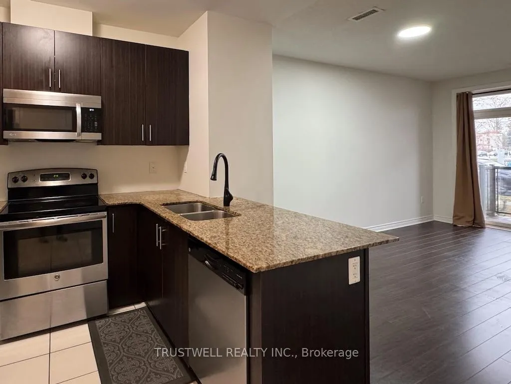 Photo 6 of Unit 108, 7768 Kennedy Road, Markham, Milliken Mills West — HOMEH