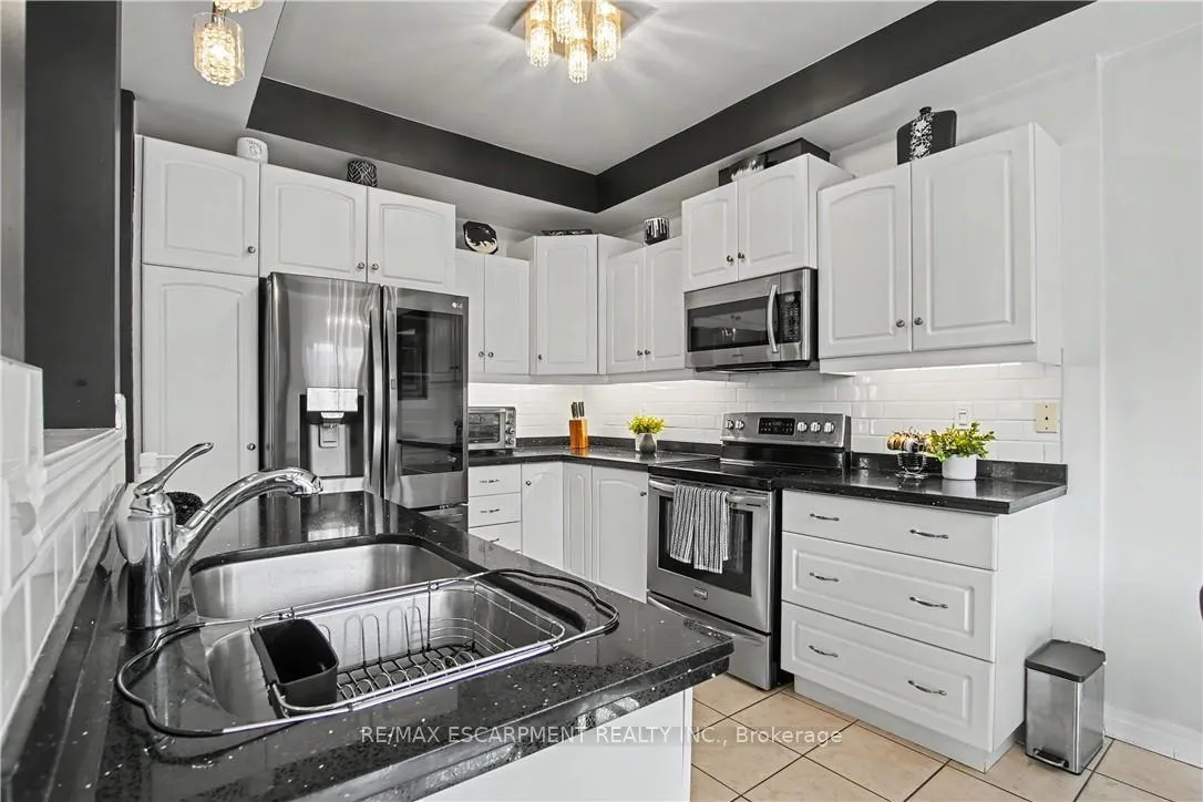 Photo 13 of Unit 31, 60 Cloverleaf Drive, Hamilton, Meadowlands — HOMEH